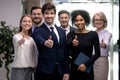 Diverse group of happy business people showing thumbs up satisfied Royalty Free Stock Photo