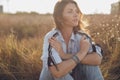 Portrait of a happy calm pretty woman outdoor