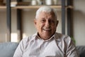 Portrait of happy candid old male pensioner. Royalty Free Stock Photo