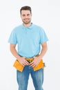 Portrait of happy carpenter wearing tool belt Royalty Free Stock Photo