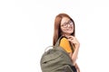 Portrait of happy casual Asian girl student with backpack isolated on white background. Back to school and learning concept Royalty Free Stock Photo