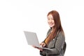 Portrait of happy casual Asian girl student with backpack and laptop isolated on white background. Back to school and learning Royalty Free Stock Photo