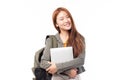 Portrait of happy casual Asian girl student with backpack and laptop isolated on white background. Back to school and learning Royalty Free Stock Photo