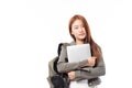 Portrait of happy casual Asian girl student with backpack and laptop isolated on white background. Back to school and learning Royalty Free Stock Photo