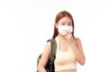 Portrait of happy casual Asian girl student wearing face mask to study with backpack and laptop back to school and learning Royalty Free Stock Photo