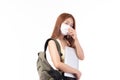 Portrait of happy casual Asian girl student wearing face mask to study with backpack and laptop back to school and learning Royalty Free Stock Photo