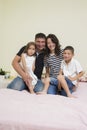 Portrait of Happy Caucasian Family with Two Kids Posing Together Royalty Free Stock Photo