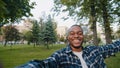 Portrait happy cheerful carefree african american man young enthusiastic exited guy student teenager male holding camera Royalty Free Stock Photo