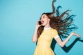 Portrait of a happy cheerful girl with long beautiful hair Royalty Free Stock Photo