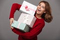 Portrait of a happy cheerful girl in red sweater Royalty Free Stock Photo