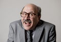 Portrait of happy and cheerful senior mature 60s business man smiling wearing dressing formal necktie looking cheerful and excited Royalty Free Stock Photo