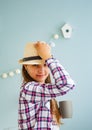 Portrait of happy, cheerful teenage girl in a hat Royalty Free Stock Photo