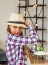 Portrait of happy, cheerful teenage girl in a hat Royalty Free Stock Photo