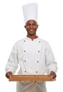 Portrait, happy chef and tray in studio in hospitality career, young cook and pride in small business entrepreneur