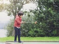 Portrait of Happy child playing mini golf in the park, Active Kid boy playing crazy golf on holiday, Children enjoying his