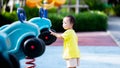 Portrait of Happy child playing with toys and enjoying the playground in the park, Sensory learning. Royalty Free Stock Photo