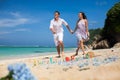 Portrait of Happy Couple, at the Beach, Holds Hands, Sea Royalty Free Stock Photo