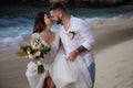 Portrait of Happy Couple, at the Beach, Holds Hands, Sea Royalty Free Stock Photo