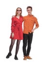 Portrait of happy couple in bright clothes embracing and looking at camera Royalty Free Stock Photo