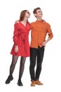 Portrait of happy couple in bright clothes embracing and looking at camera Royalty Free Stock Photo