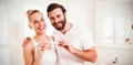 Portrait of happy couple checking pregnancy test Royalty Free Stock Photo