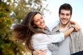 Portrait of happy couple embracing outdoors. Royalty Free Stock Photo