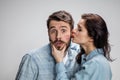 Portrait of happy couple on gray background Royalty Free Stock Photo