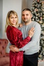 Portrait of happy couple hugging and celebrating winter holidays Royalty Free Stock Photo