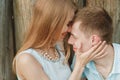 Portrait of Happy Couple Hugging Laughing Wooden Background