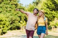 portrait of happy couple in love walking in summer