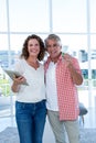 Portrait of happy couple standing at home Royalty Free Stock Photo