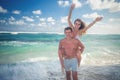 Portrait of happy couple taveling at Bali, walk at beach Royalty Free Stock Photo