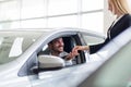 Portrait of happy customer buying new car Royalty Free Stock Photo