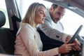 Portrait of happy customer buying new car Royalty Free Stock Photo