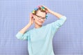 Portrait of happy cute girl with bright colorful hair curlers on head Royalty Free Stock Photo