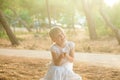 Portrait of happy cute brunette child girl on in summer park outdoors Royalty Free Stock Photo