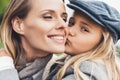 portrait of happy daughter kissing Royalty Free Stock Photo