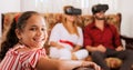 Portrait Of Happy Daughter And Parents Playing Virtual Reality