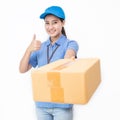 Portrait of happy delivery asian woman her hands holding cardboard box Royalty Free Stock Photo