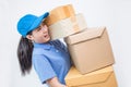 Portrait of happy delivery asian woman her hands holding cardboard box Royalty Free Stock Photo