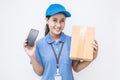 Portrait of happy delivery asian woman her hands holding cardboard box Royalty Free Stock Photo