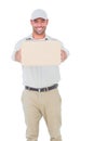 Portrait of happy delivery man giving package Royalty Free Stock Photo