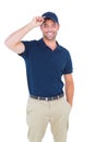 Portrait of happy delivery man wearing cap Royalty Free Stock Photo