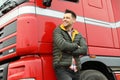 Portrait of happy driver at modern truck