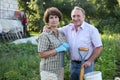 Portrait of happy elderly couple in the garden Royalty Free Stock Photo
