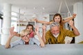 Portrait of happy elderly couple and grandchildren playing together Royalty Free Stock Photo