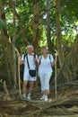 Portrait of happy elderly couple in tropical forest Royalty Free Stock Photo