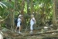 Portrait of happy elderly couple in tropical forest Royalty Free Stock Photo