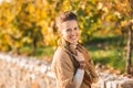 Portrait of happy elegant brunette woman in autumn outdoors Royalty Free Stock Photo