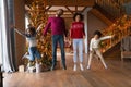 Portrait of happy ethnic family with kids on Christmas morning Royalty Free Stock Photo